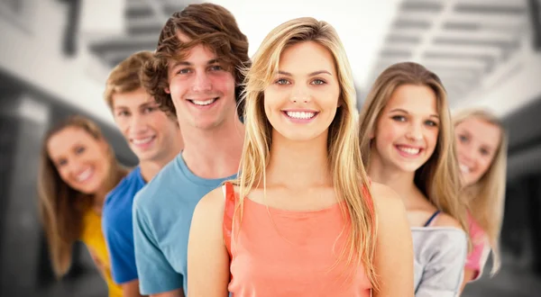 Teenagers standing behind one another — Stock Photo, Image
