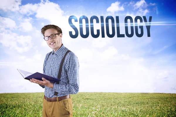 Ordet sociologi och student läsa bok — Stockfoto
