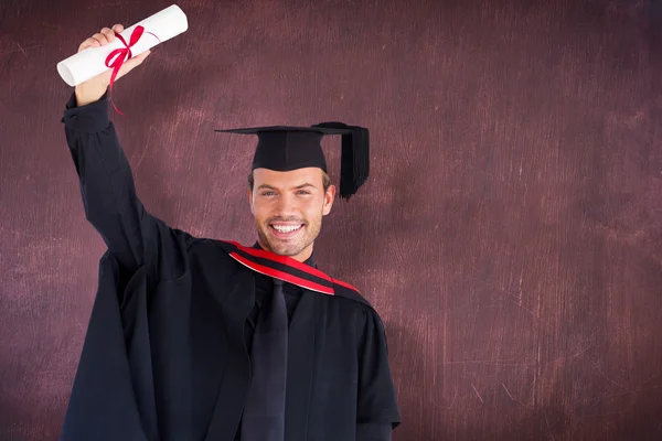 Menino atraente feliz após sua formatura — Fotografia de Stock