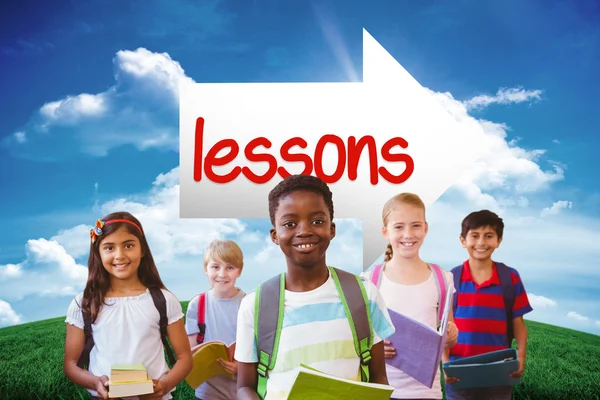 Lecciones de palabras y niños sonrientes de la escuela —  Fotos de Stock