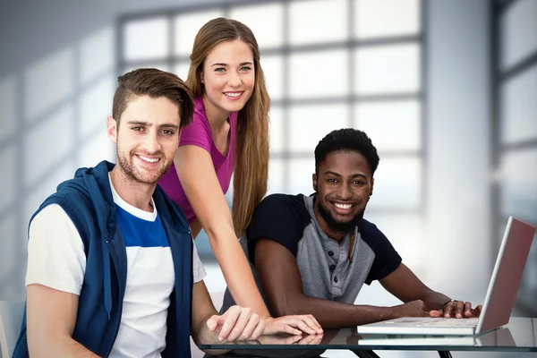 Creative team using laptop — Stock Photo, Image