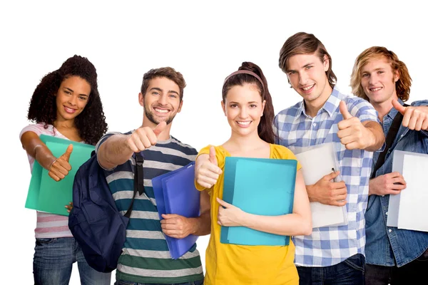 College students gesturing thumbs up Royalty Free Stock Photos
