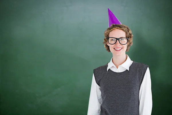 Geeky hipster wearing a party hat — Stock Photo, Image