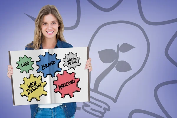 Woman holding banner with cogs and wheels — Stock Photo, Image