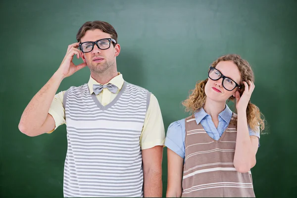 Geeky hipster couple thinking — Stock Photo, Image