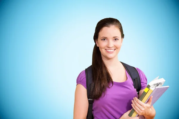 Estudiante sosteniendo cuadernos — Foto de Stock