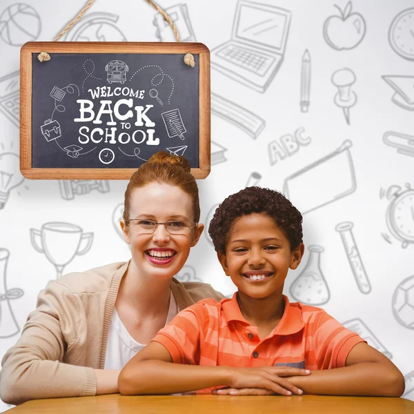 Happy pupil and teacher — Stock Photo, Image