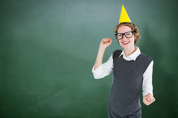 Geeky hipster wearing a party hat — Stock Photo, Image