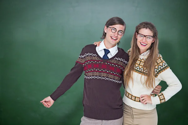 Happy geeky hipster couple embracing — Stock Photo, Image