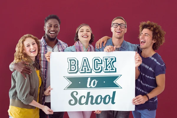 Studenten met terug naar school board — Stockfoto