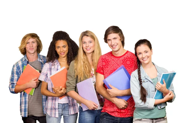 Studenti universitari che tengono libri in biblioteca — Foto Stock