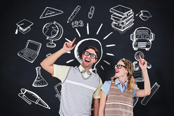 Hipster couple pointing up — Stock Photo, Image