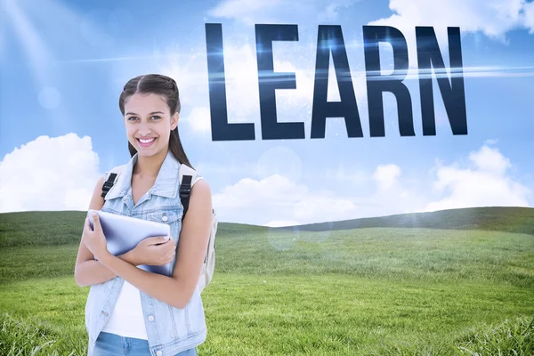 Palavra aprender e estudante segurando tablet — Fotografia de Stock