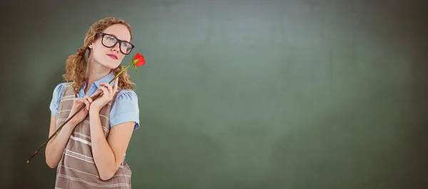 Geeky hipster woman holding rose — Stock Photo, Image