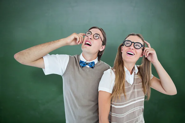 Geeky hipsters looking confused — Stock Photo, Image