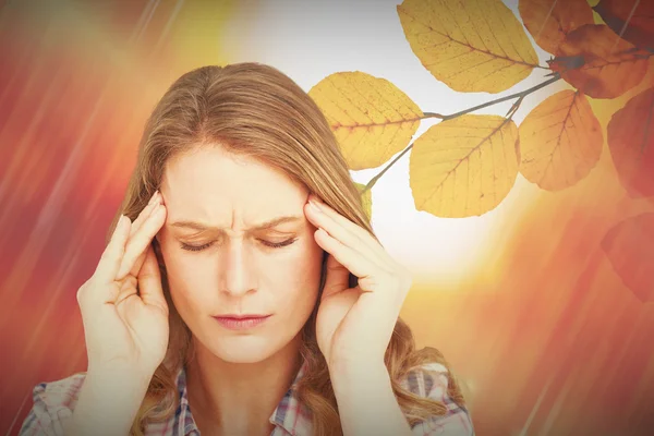 Composite image of pretty hipster with headache — Stock Photo, Image