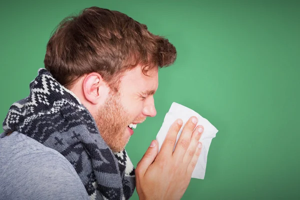 Close up side view of man blowing nose — Stock Photo, Image