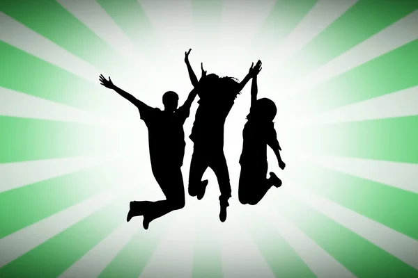 Silhouette of people jumping — Stock Photo, Image