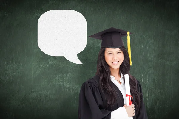 Donna vestita con la sua veste di laurea — Foto Stock