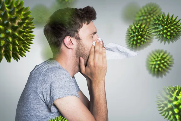 Close up side view of man blowing nose — Stock Photo, Image