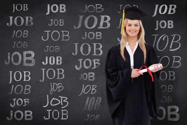 Blond student i graduate robe — Stockfoto