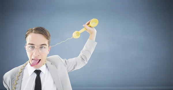 Businessman being strangled by phone cord — Stock Photo, Image