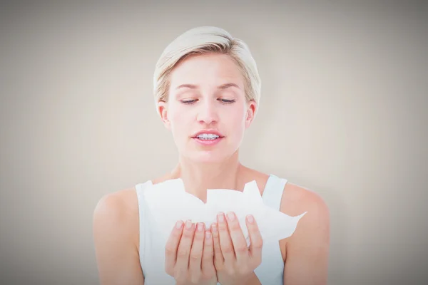 Sick woman holding tissues — Stock Photo, Image