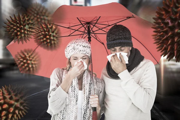 Ill couple sneezing in tissue — Stock Photo, Image