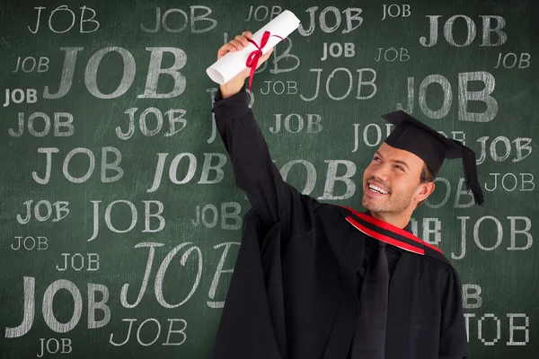 Joyeux garçon attrayant célébrant sa graduation — Photo