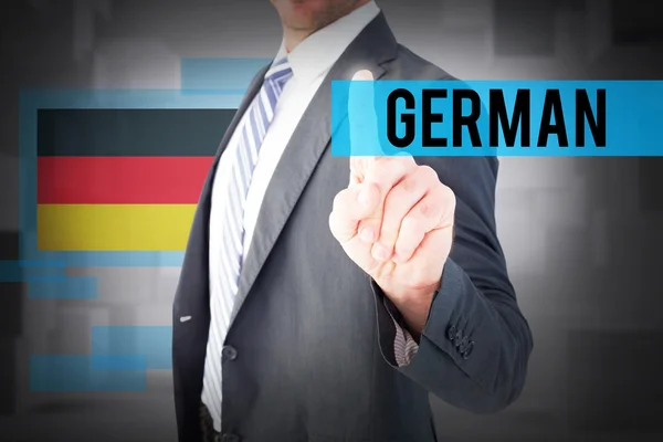 Wort deutsch und Geschäftsmann — Stockfoto