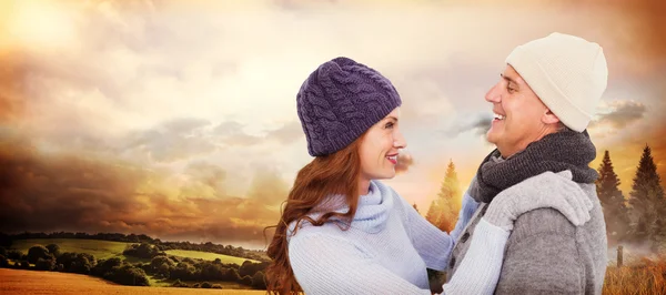 Happy couple in warm clothing — Stock Photo, Image