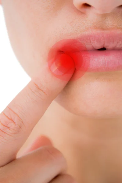 Mujer señalando sus labios —  Fotos de Stock