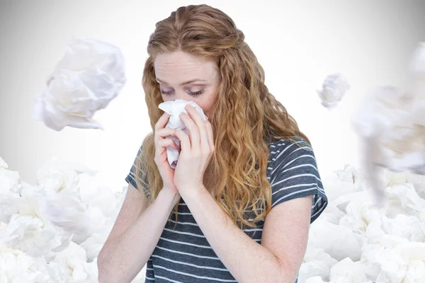 Sick blonde woman blowing her nose — Stock Photo, Image
