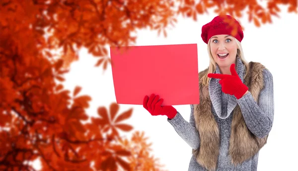 Blonde woman holding red sign — Stock Photo, Image