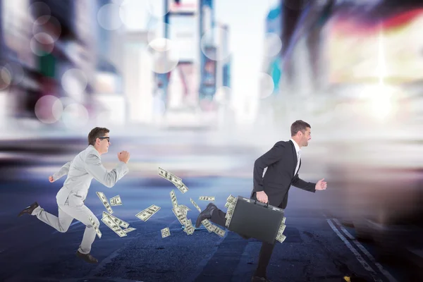 Running businessmen against blurry street — Stock Photo, Image