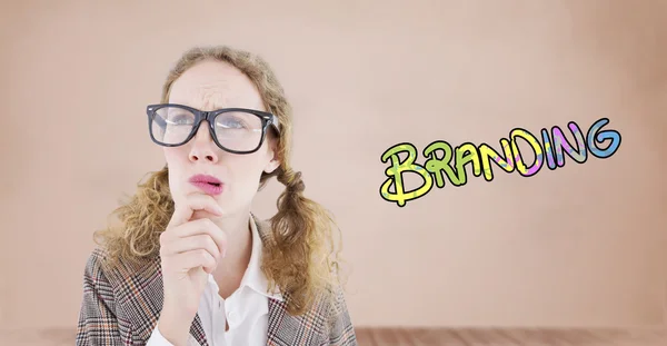 Geeky hipster woman thinking with hand — Stock Photo, Image