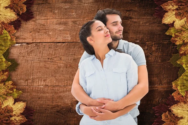 Cute couple embracing with eyes closed — Stock Photo, Image