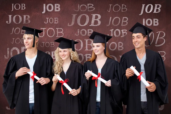 Grupp människor firar efter examen — Stockfoto