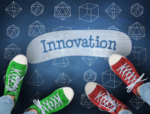 Innovation against blue chalkboard — Stock Photo, Image