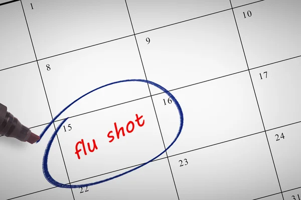 Inscriptie in de kalender "flu Shots" — Stockfoto