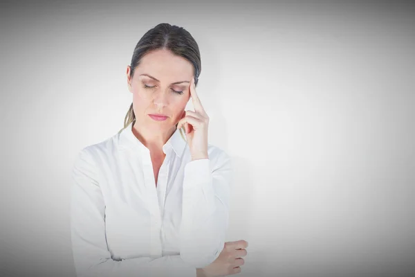 Businesswoman suffering from headache — Stock Photo, Image