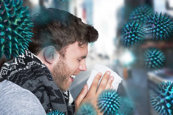 Close up side view of man blowing nose — Stok Foto