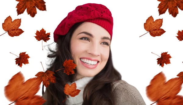 Brunette woman against autumn leaves — Stock Photo, Image