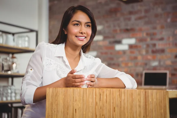 Pretty brunette having cup of coffee — Stock Photo, Image
