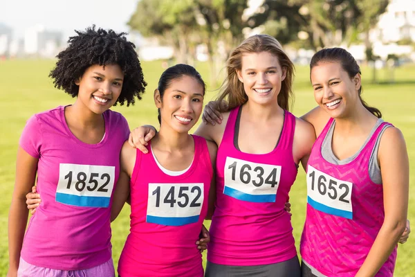 Négy mosolygó futók — Stock Fotó
