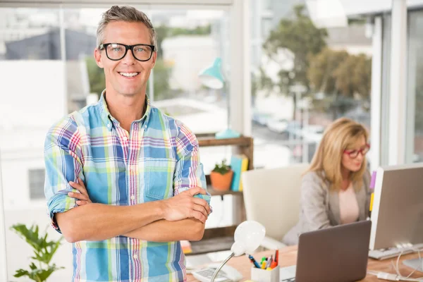 Designer in front of his working colleague — Stock Photo, Image