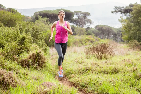 Atleta loira bonita jogging — Fotografia de Stock