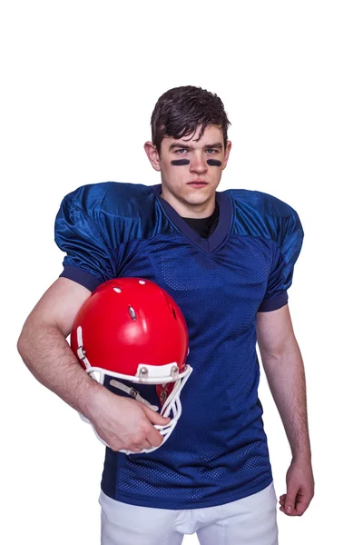 ヘルメットを保持しているアメリカン ・ フットボール プレーヤー — ストック写真