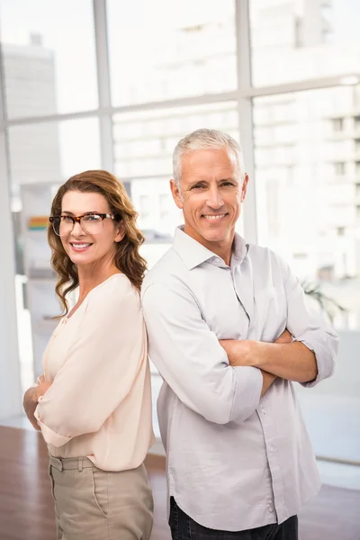 Business colleagues with arms crossed — Stock Photo, Image