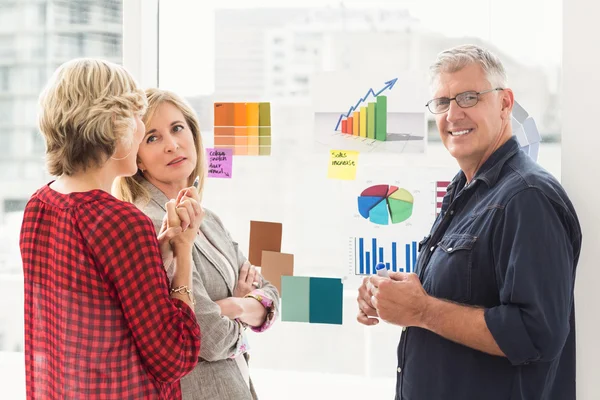 Smiling business team working — Stock Photo, Image